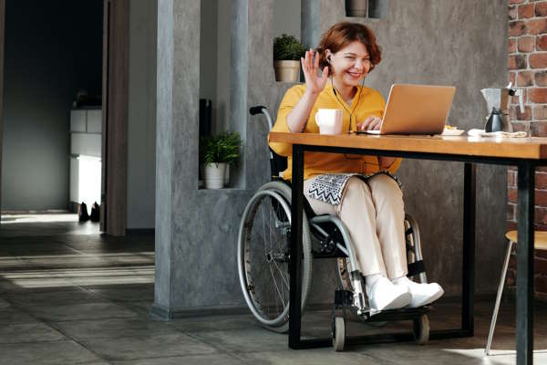 Woman in wheelchair smiling