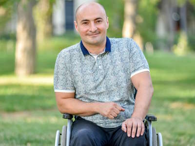 Man in Wheelchair Outside