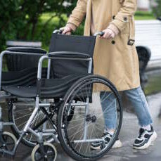 Person Pushing Wheelchair